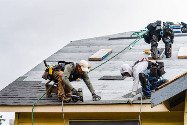 Professional Gutter Installation technician working in Dunlo, PA